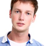 young and attractive boy on white background